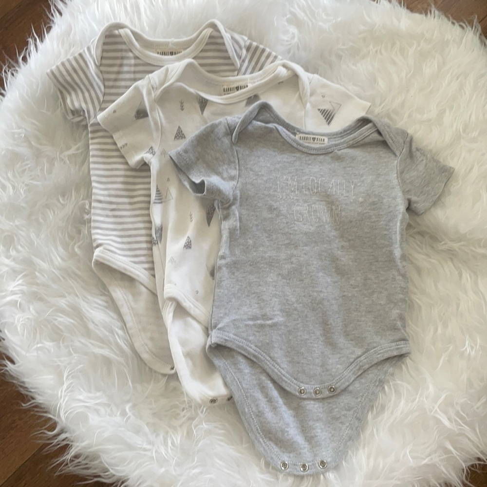 Never worn baby onesies.